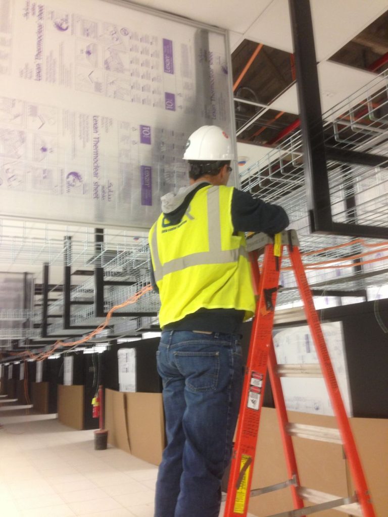 technician building aisle containment system